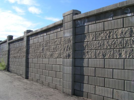 Concrete block wall built along a residential property